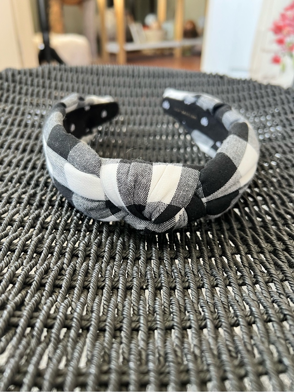 Lele Sadoughi black and white buffalo checked pattern knotted headband.